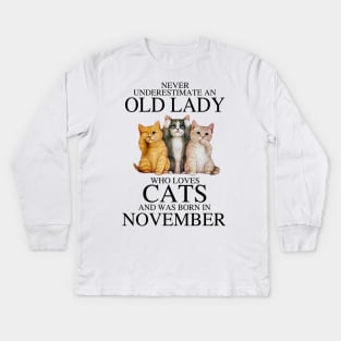 Never Underestimate An Old Lady Who Loves Cats November Kids Long Sleeve T-Shirt